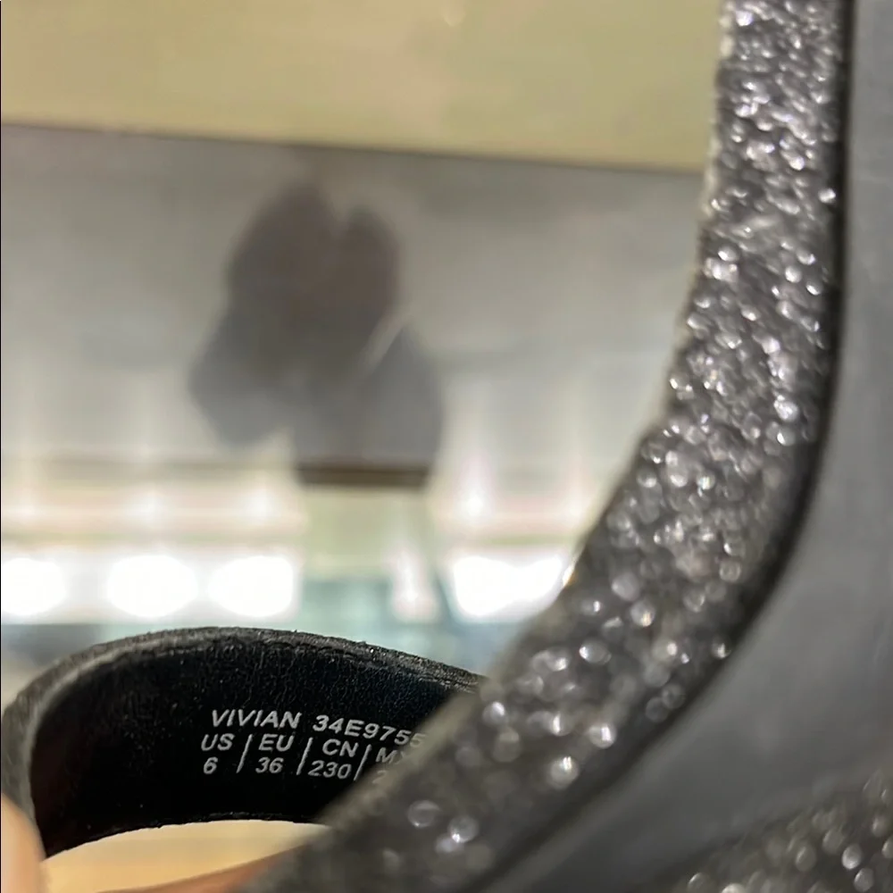 Calvin Klein Sleek Black Stiletto Heels with Ankle Strap